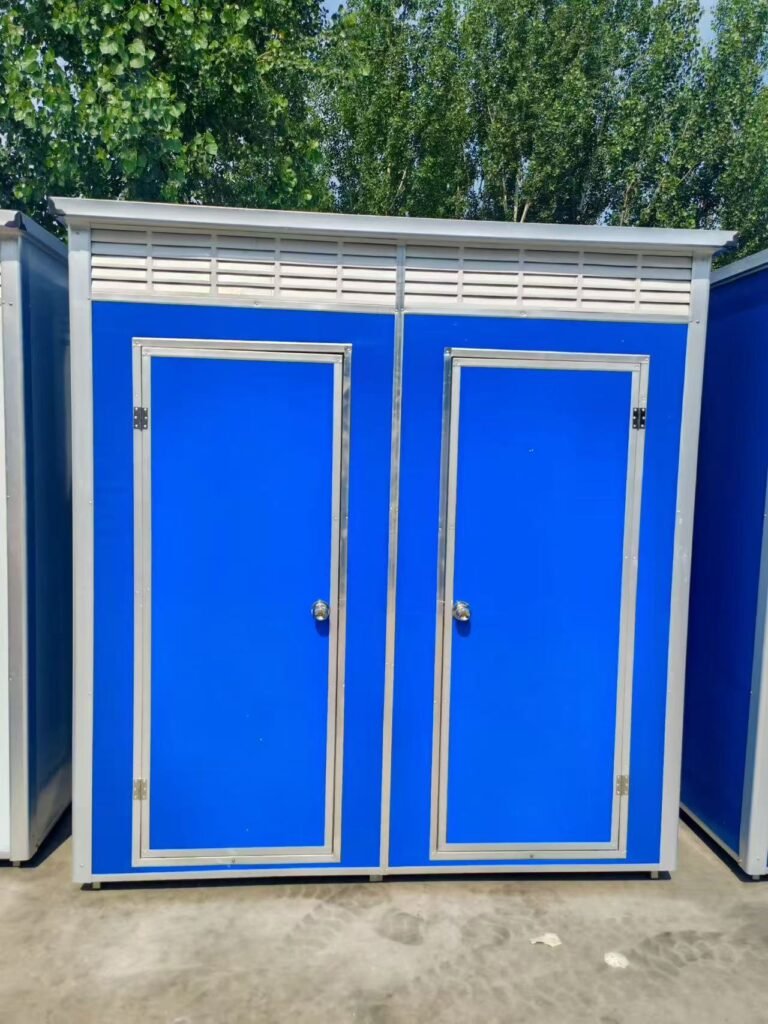 Blue double portable restroom unit with two stalls, prefabricated mobile toilet for construction sites, festivals, and outdoor gatherings