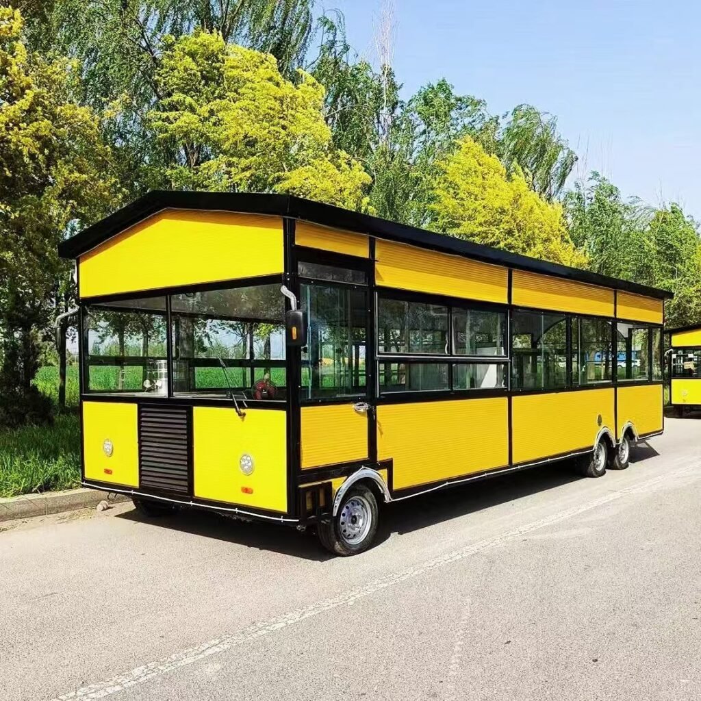Bright yellow large mobile food trailer with panoramic windows, towable street food truck for sale, fully equipped catering cart for commercial use